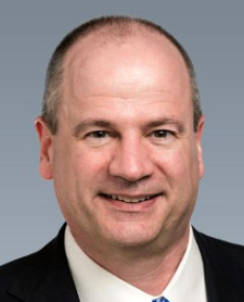 Tom Kiraly of Hanger Inc. seems to be fat and bald now